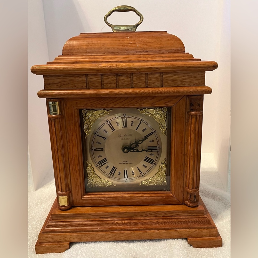Elgin Clock Co.  Est. 1863.  Quartz. Westminster Chime.  Wood. Battery operated.